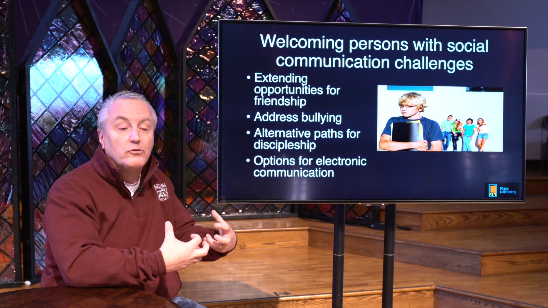 man teaches on disability and communication challenges in church