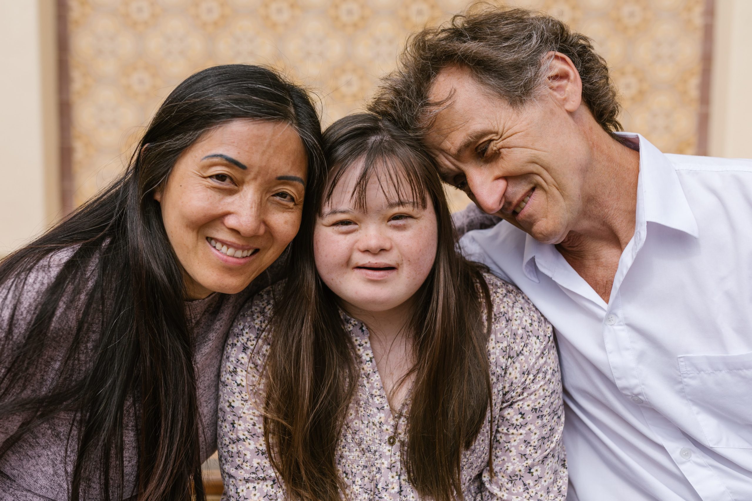 family of three with daughter who has down syndrome