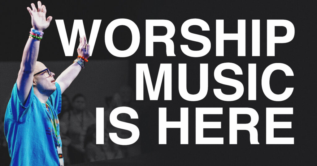Person with raised arms in front of large text reading WORSHIP MUSIC IS HERE on a dark background, celebrating worship music and Ability Ministry.