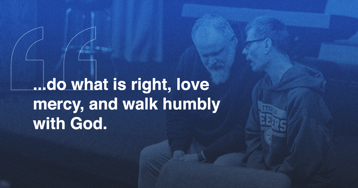 Two people sit and talk closely on a bench; overlaid text reads, ...do what is right, love mercy, and walk humbly with God. Walk This Way.